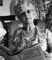 lansbury-as-miss-marple-reading-up-on-poisons