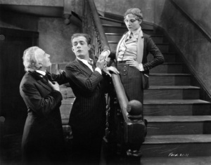 Emile Chautard, Earle Fox, and Nancy Nash in a scene from UPSTREAM, 1927.